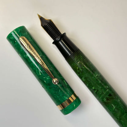 Sheaffer Flat Top, SR Fountain Pen, Jade Green, 14K Sheaffer Lifetime Nib Name/Type: Sheaffer Flat Top Manufacture Year: 1920s Length: 5 1/4 Filling System: Lever-Fill; restored with new sac Color/Pattern: Jade Green with gold-filled trim Nib Type/Conditi