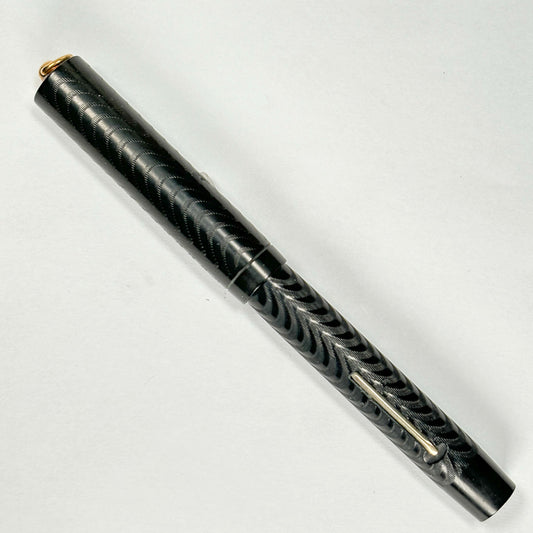 Craig (Sub Brand of Sheaffer) Chased Black Hard Rubber Fountain Pen, Ring Top, Restored Lever Fill Name/Type: Craig Hard Rubber Ring Top Manufacture Year: 1920s Length: 4 3/8 Filling System: Lever Filler; restored Color/Pattern: Black Chased Hard Rubber N