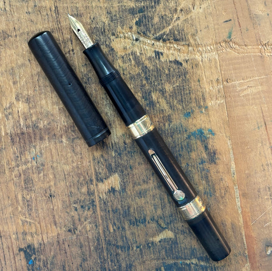Waterman 12 PSF, Black Chased Hard Rubber, 14K Waterman Nib - FlexibleName/Type: Waterman 12 PSF Manufacture Year: Late teens Length: 5 1/4 Filling System: Lever Filler Color/Pattern: Black chased hard rubber with gold-filled bands Nib Type/Condition and