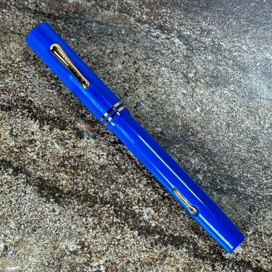 Conklin Economy Line, Blue Lever Filler, Flexible 14K nib Name/Type: Conklin Manufacture Year: 1927 Length: 4 7/8 Filling System: Lever-Filler Color/Pattern: Blue Nib Type/Condition and remarks: Conklin Toledo 14K flexible nib In excellent condition, it h