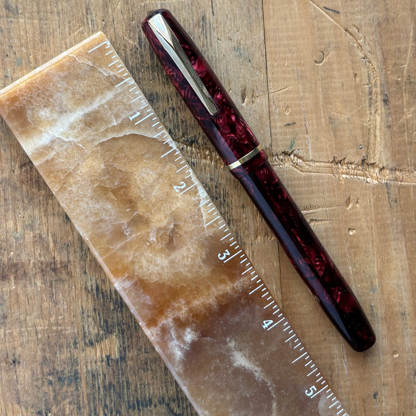 Sheaffer WASP, Lever-fil, Two-tone WASP NibName/Type: Sheaffer WASP Clipper Manufacture Year: Late 1930s Length: 5 Filling System: Lever-Fil, Restored with new seals. Color/Pattern: Red and black, gold-filled trim. Nib Type/Condition and remarks: Smooth a