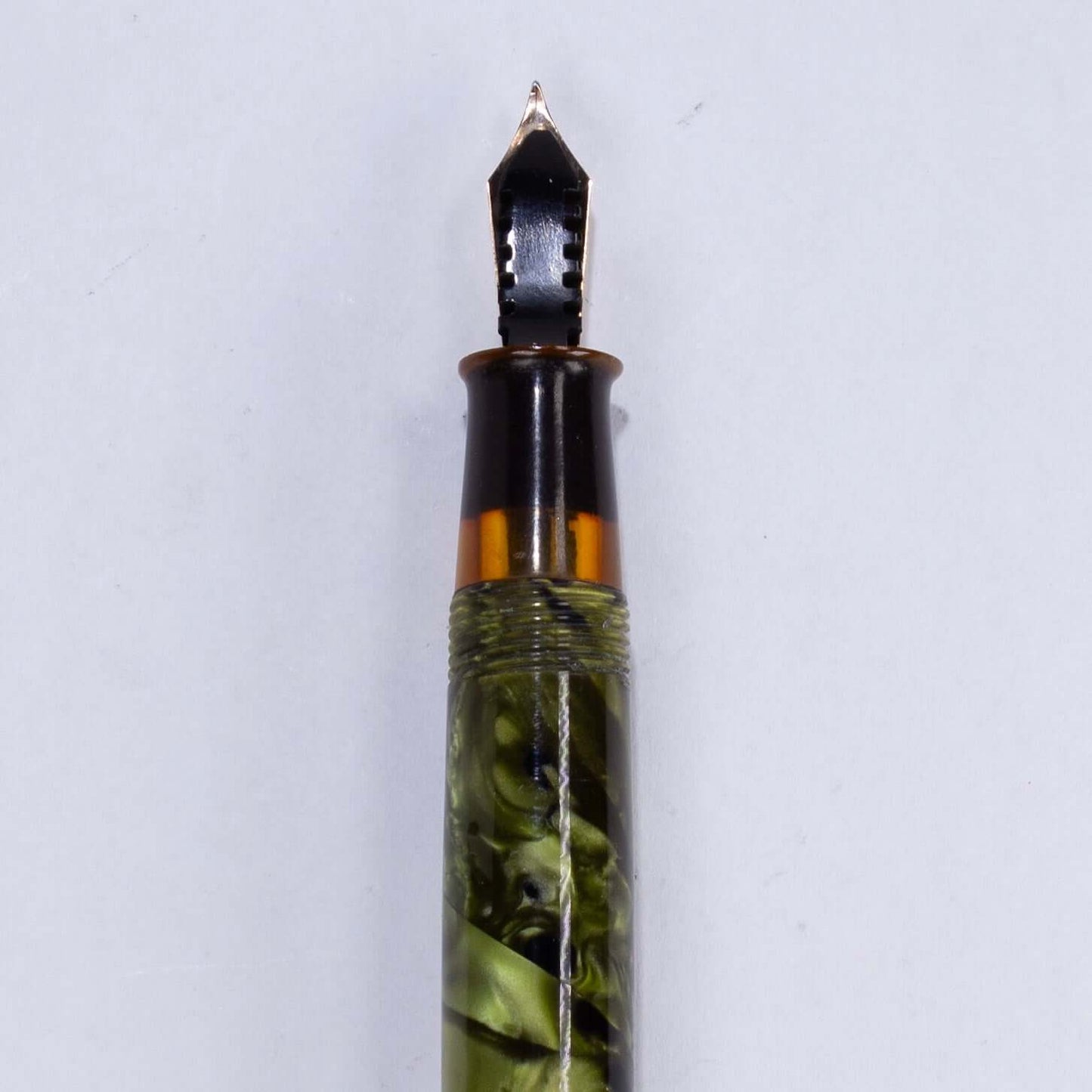 ${titleName/Type: Restored WASP Vacuum-fil Fountain Pen Manufacture Year: Circa 1930s Length: 5 Filling System: Lever Filler Color/Pattern: Green Birdseye, some refer to this color as Screaming Souls in Purgatory. Nib Type/Condition and remarks: 12K Gold