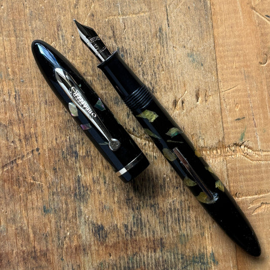 Sheaffer Balance, Ebonized Pearl, Lever FillerName/Type: Sheaffer Balance Manufacture Year: Mid 1930s Length: 4 7/8 Filling System: Lever filler; restored with new sac Color/Pattern: Ebonized Pearl with gold-filled trim Nib Type/Condition and remarks: Smo