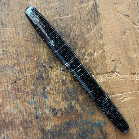 Double Jewel Parker Vacumatic; Silver PearlName/Type: Parker Vacumatic Manufacture Year: 1940 Length: 5 Filling System: Vacumatic with speed line filler Color/Pattern: Silver Pearl with Nickel Trim, two cap bands and double jeweled Nib Type/Condition and