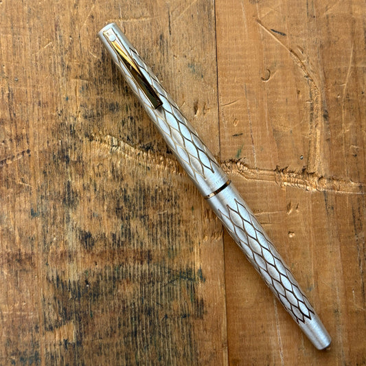 Lady Sheaffer 642-R, Satin TulleLength: 5 1/8 Filling System: Cartridge - Converter Color/Pattern: Satin Tulle with red section Nib Type/Condition and remarks: Fine 14k nib Condition: In excellent condition, still stickered and has no chips, cracks, or de