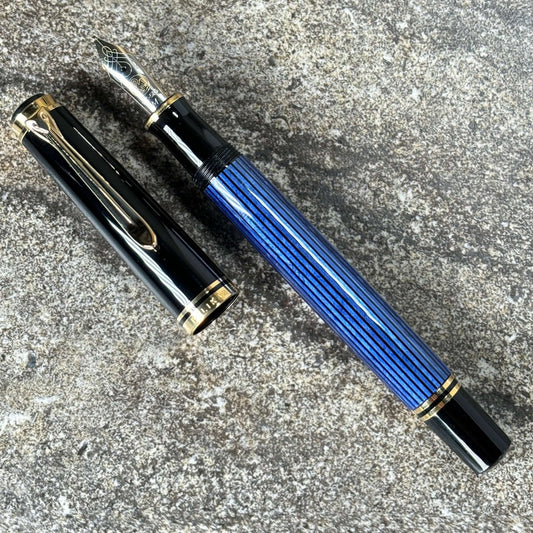 Pelikan M600 Blue/Black. Medium two tone nib, piston filler. Ozark Pen Shop