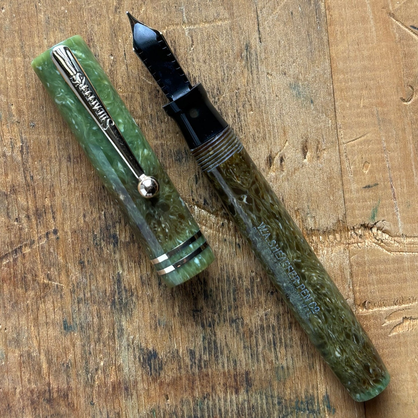 Sheaffer Flat Top JR; Jade GreenName/Type: Sheaffer Flat Top JR Manufacture Year: 1930 Length: 4 5/8 Filling System: Lever Filler Color/Pattern: Jade Green Nib Type/Condition and remarks: Medium 14K Lifetime Condition: In very good condition; it has a nam