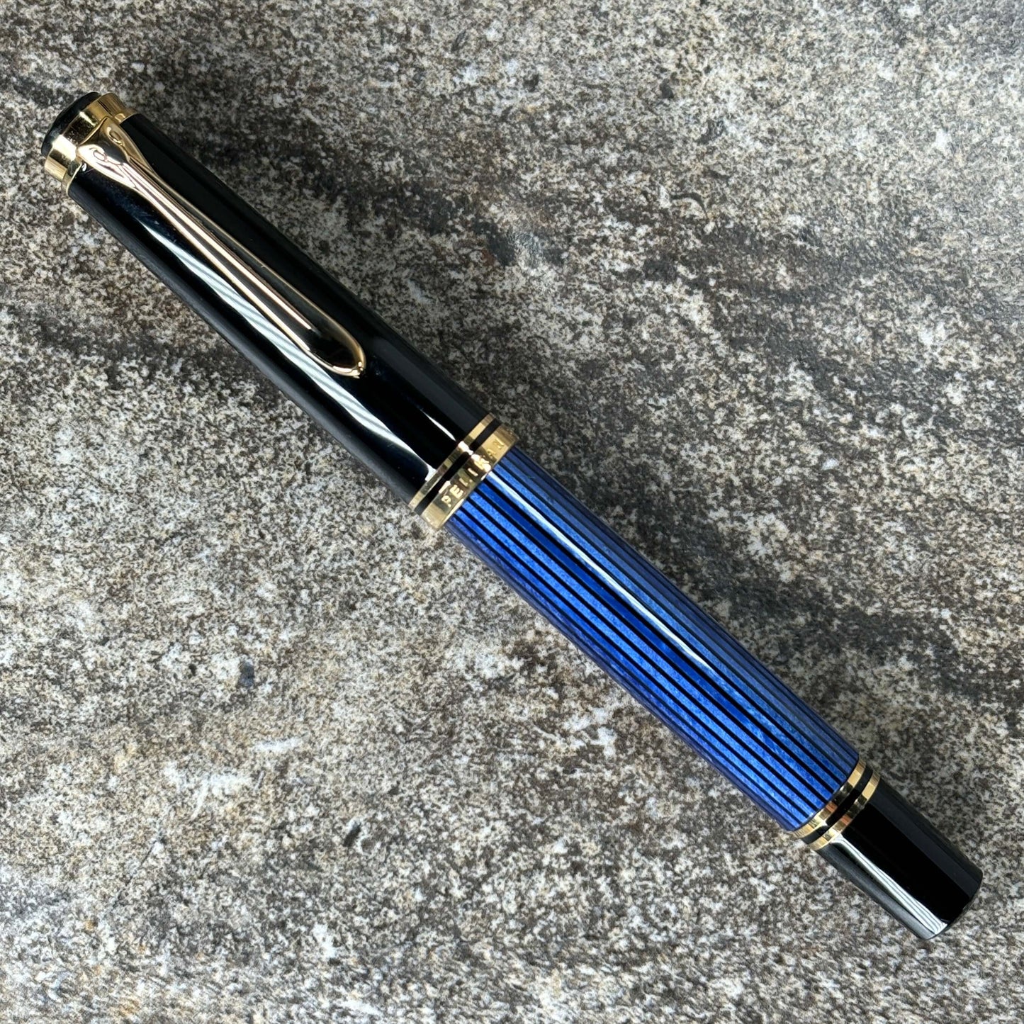 Pelikan M600 Blue/Black. Medium two tone nib, piston filler. Ozark Pen Shop