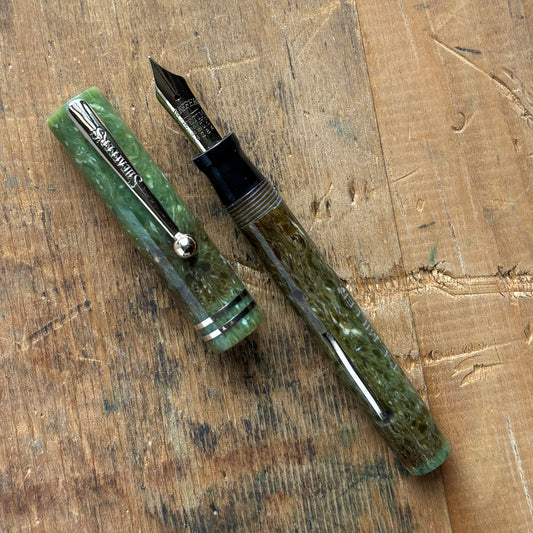 Sheaffer Flat Top JR; Jade GreenName/Type: Sheaffer Flat Top JR Manufacture Year: 1930 Length: 4 5/8 Filling System: Lever Filler Color/Pattern: Jade Green Nib Type/Condition and remarks: Medium 14K Lifetime Condition: In very good condition; it has a nam