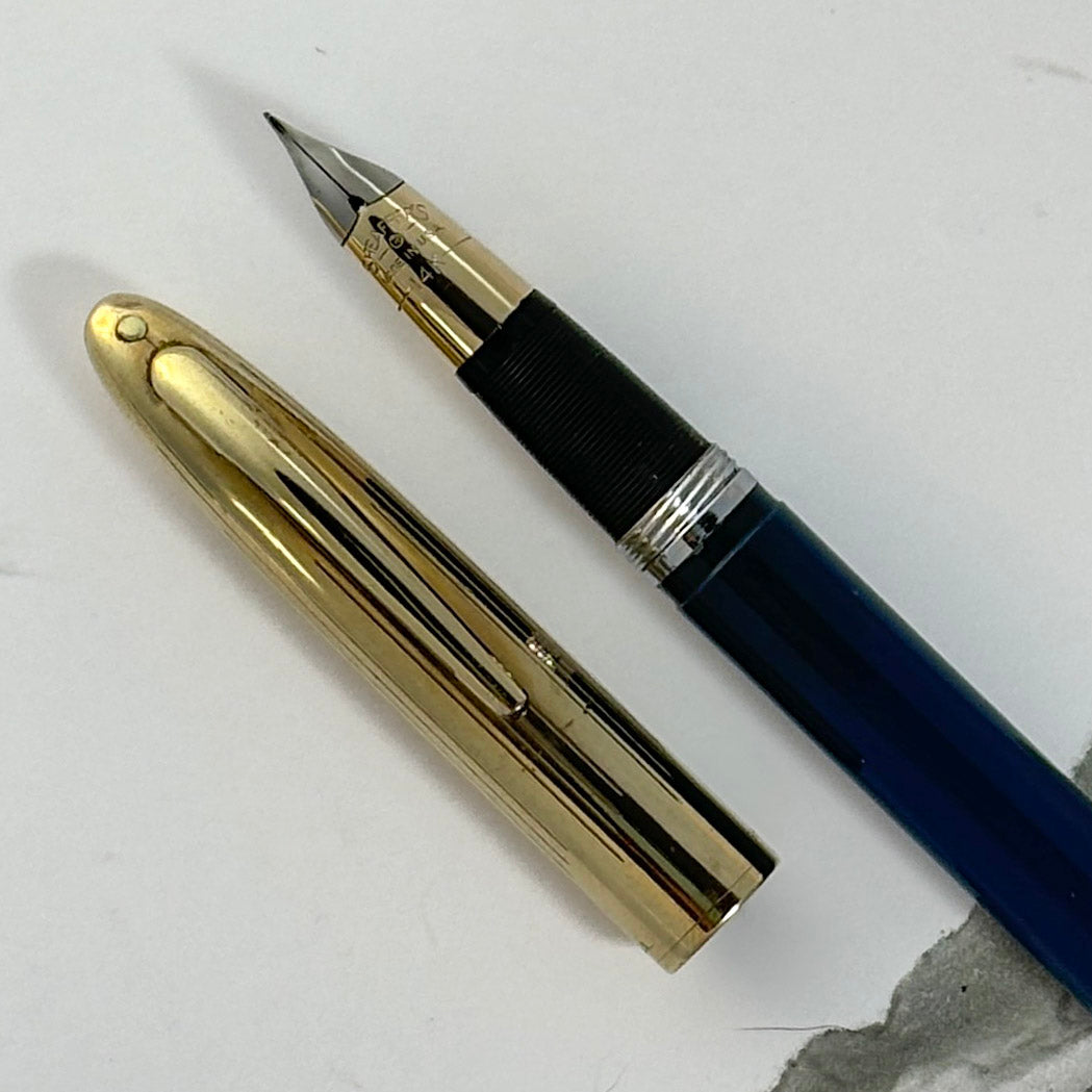 Sheaffer Touchdown TM Crest Deluxe; Persian Blue Barrel with GF Cap, Fine 14K two-tone triumph nib. Ozark Pen Shop