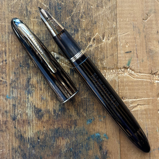 Sheaffer Triumph Sovereign II 1500, Golden Brown, Wire BandName/Type: Sheaffer Triumph Sovereign II 1500 Manufacture Year: 1940s Length: 4 7/8 Filling System: Restored Vac-fil Color/Pattern: Golden Brown with gold-filled trim Nib Type/Condition and Remark
