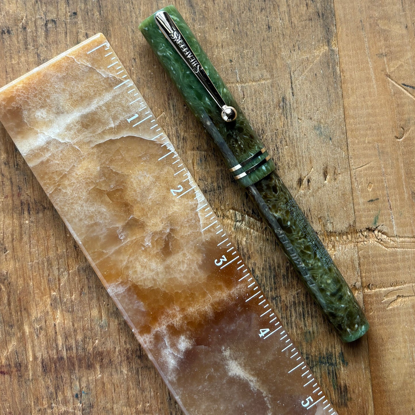 Sheaffer Flat Top JR; Jade GreenName/Type: Sheaffer Flat Top JR Manufacture Year: 1930 Length: 4 5/8 Filling System: Lever Filler Color/Pattern: Jade Green Nib Type/Condition and remarks: Medium 14K Lifetime Condition: In very good condition; it has a nam