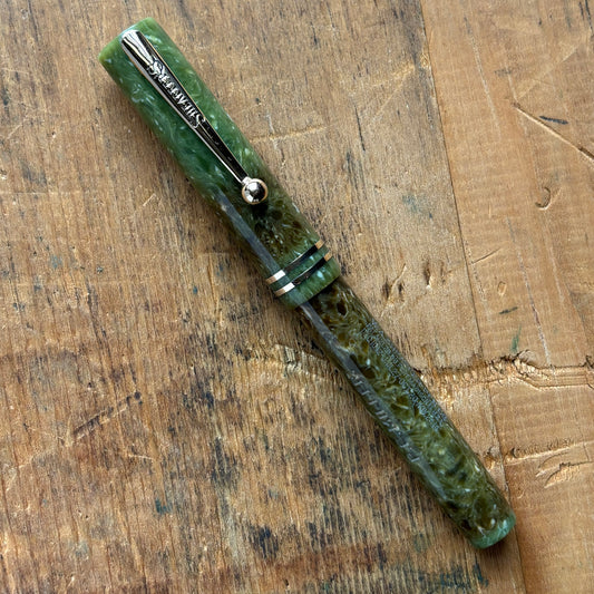 Sheaffer Flat Top JR; Jade GreenName/Type: Sheaffer Flat Top JR Manufacture Year: 1930 Length: 4 5/8 Filling System: Lever Filler Color/Pattern: Jade Green Nib Type/Condition and remarks: Medium 14K Lifetime Condition: In very good condition; it has a nam