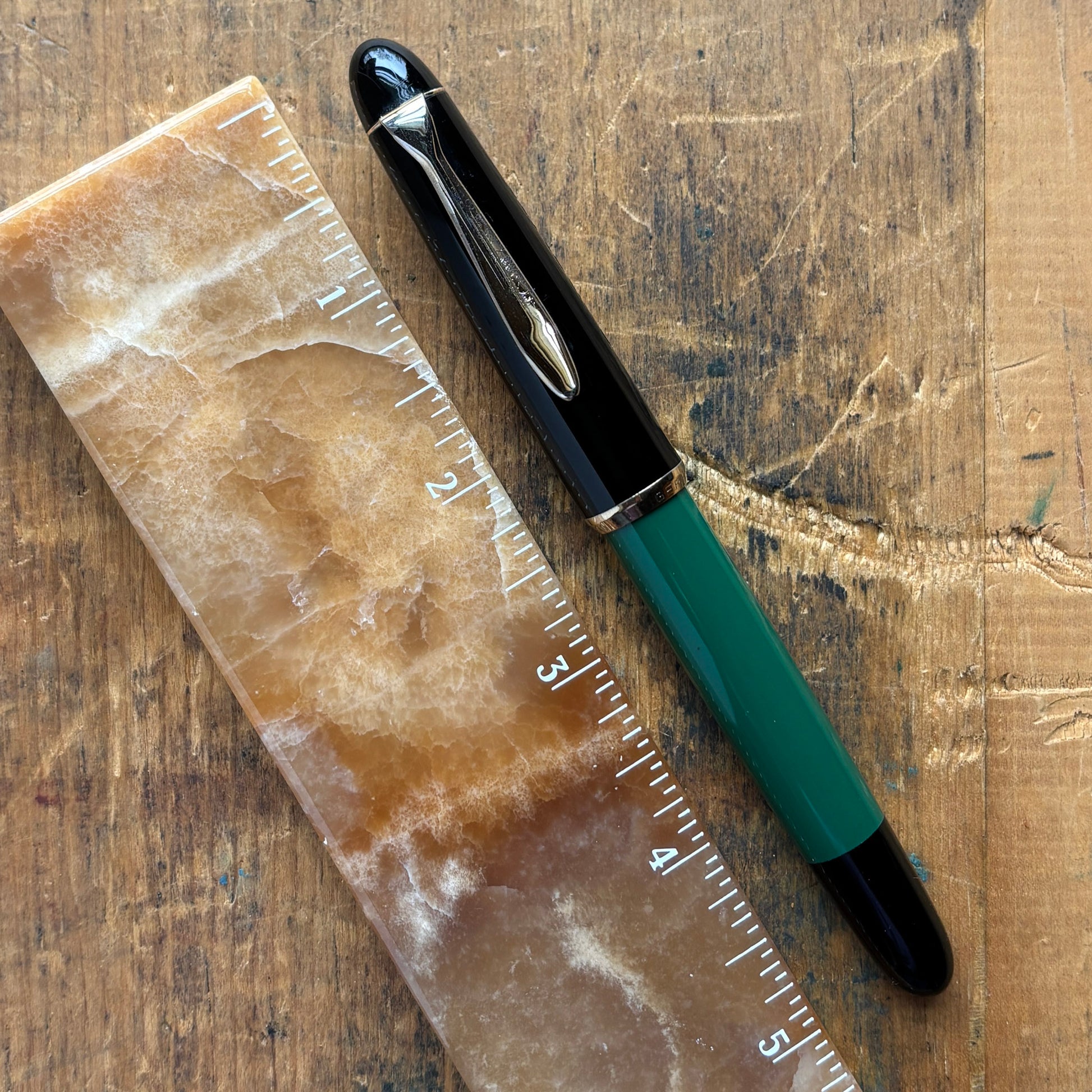 Pelikan 120 Green/Black. Medium Flexy Steel nibName/Type: Pelikan 120 Length: 5 1/8 Filling System: Piston Filler Color/Pattern: Green/Black Nib Type/Condition and Remarks: Flexy steel, medium nib The pen is in very good condition, and the plating on the