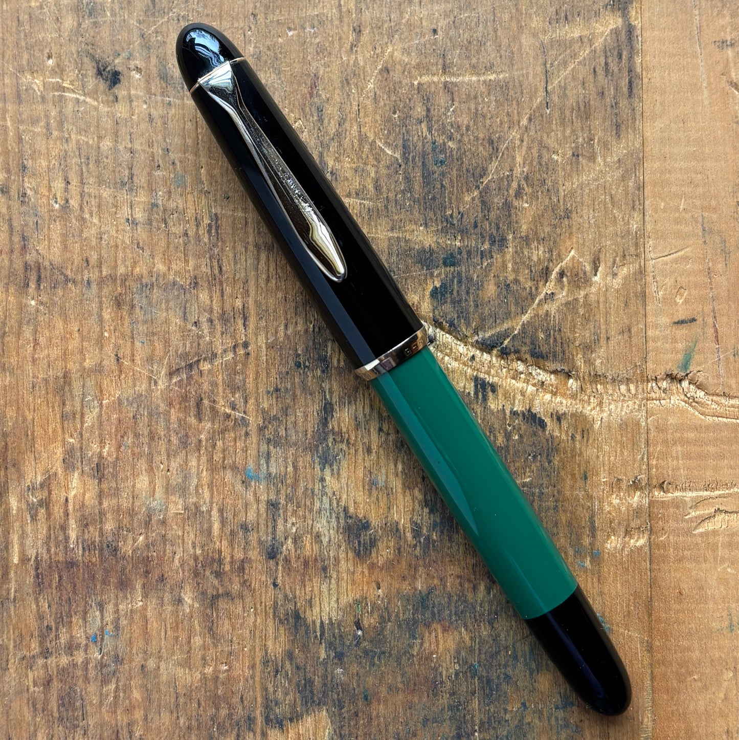 Pelikan 120 Green/Black. Medium Flexy Steel nibName/Type: Pelikan 120 Length: 5 1/8 Filling System: Piston Filler Color/Pattern: Green/Black Nib Type/Condition and Remarks: Flexy steel, medium nib The pen is in very good condition, and the plating on the