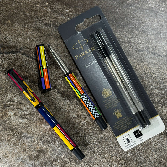 Parker Vector Rollerball Pen Pack Name/Type: Parker Vector RollerballManufacture Year: Early 1990sLength: 5 1/8Filling System: RollerballColor/Pattern: "Stained glass" pattern with black trimCondition: N.O.S. sold in a set of two pens with two refills.