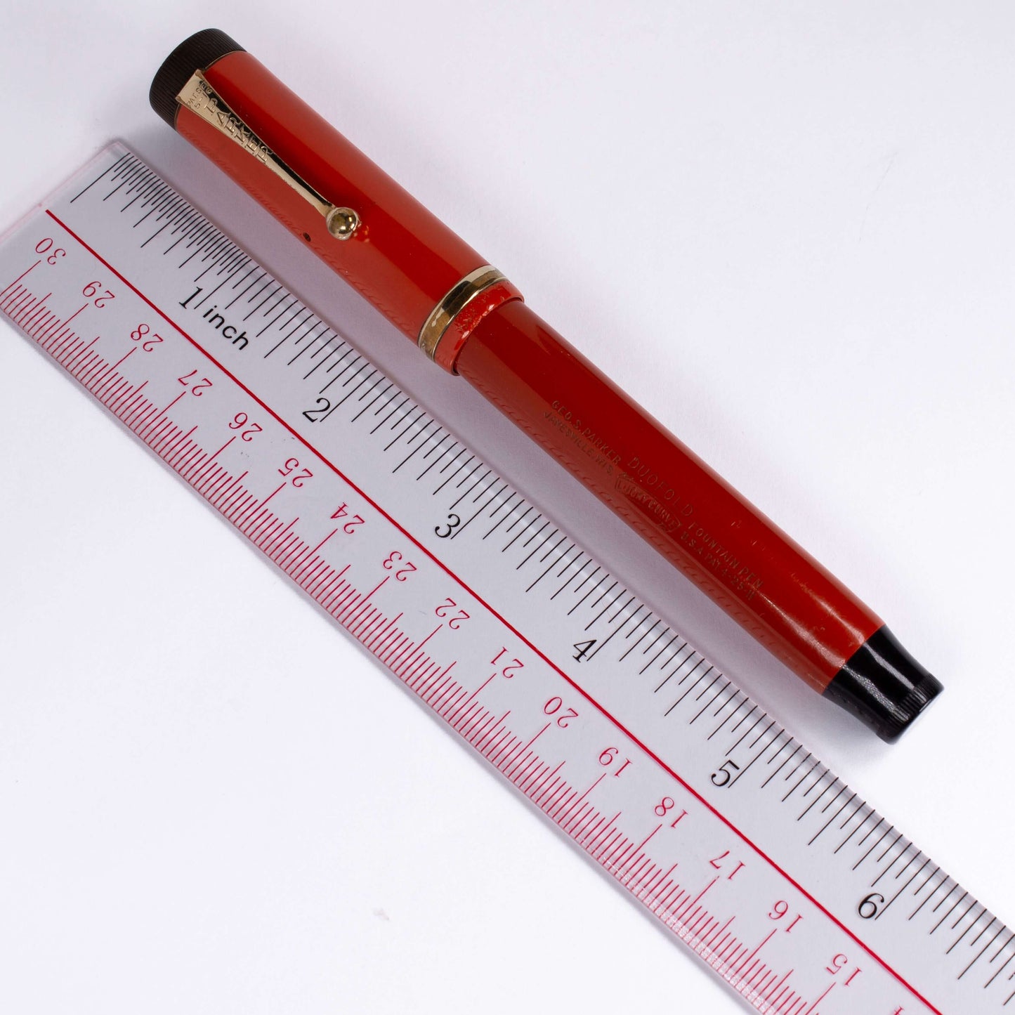 Parker Duofold Senior, Red Hard Rubber, Raised Cap Band, Button Fill, Large 14K Gold Duofold nib. Comes in original box with instruction sheet. Ozark Pen Shop