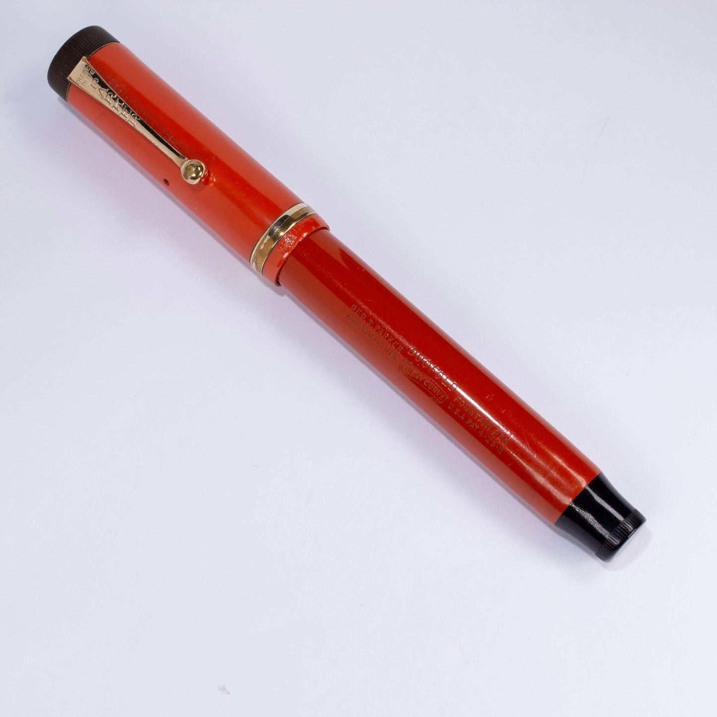 Parker Duofold Senior, Red Hard Rubber, Raised Cap Band, Button Fill, Large 14K Gold Duofold nib. Comes in original box with instruction sheet. Ozark Pen Shop