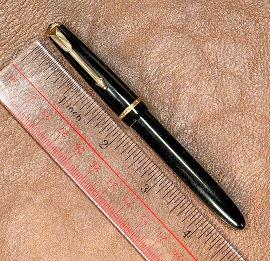 Parker Lady Duofold, England Made, Black with Gold filled Trim, Aerometric Filler, Hooded Nib Name/Type: Parker Lady Duofold Manufacture Year: 1950s and 1960s Length: 4 1/2 Filling System: Aerometric Color/Pattern: Black with gold-filled trim Nib Type/Con