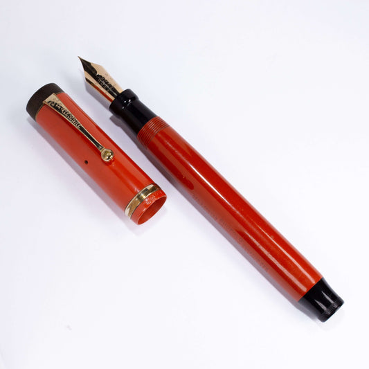 Parker Duofold Senior, Red Hard Rubber, Raised Cap Band, Button Fill, Large 14K Gold Duofold nib. Comes in original box with instruction sheet. Ozark Pen Shop