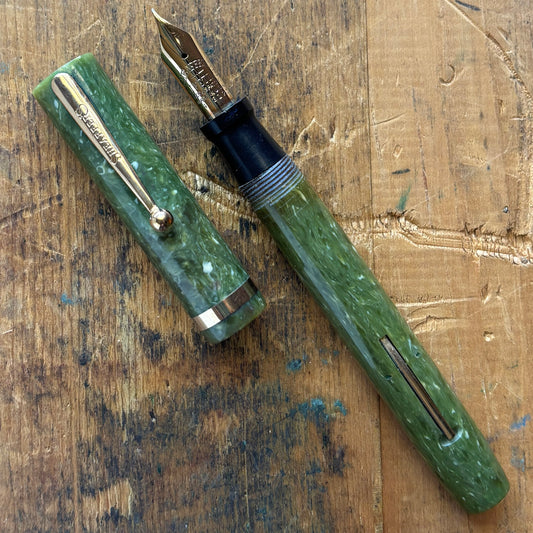Sheaffer Flat Top Lifetime Fountain Pen, OversizedName/Type: Sheaffer Flat Top Lifetime Manufacture Year: 1920s Length: 5 3/8 Filling System: Restored lever filler with a new sac Color/Pattern: Jade Green Nib Type/Condition and remarks: Large 14K Medium L