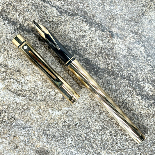 Sheaffer Targa Slimline, 23K electroplated finish with fluted pattern. 14K inlaid nib. Ozark Pen Shop