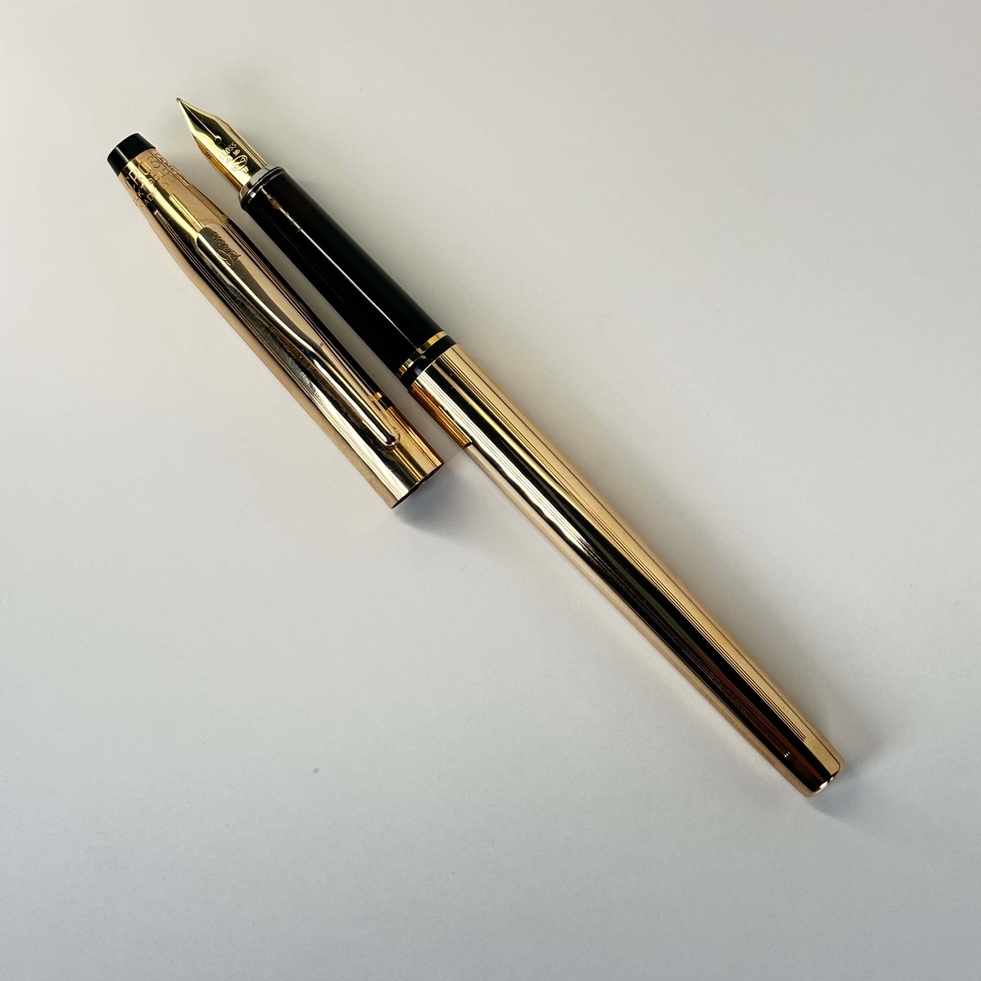 Cross Century II, 14K Gold Filled Cap and Barrel, 14K Gold Medium Nib Name/Type: Cross Century II Manufacture Year: 1980s Length: 5 1/4 Filling System: Cartridge/Converter, (Converter is included) Color/Pattern: Cap and Barrel made of 14K Gold Fill. Nib T