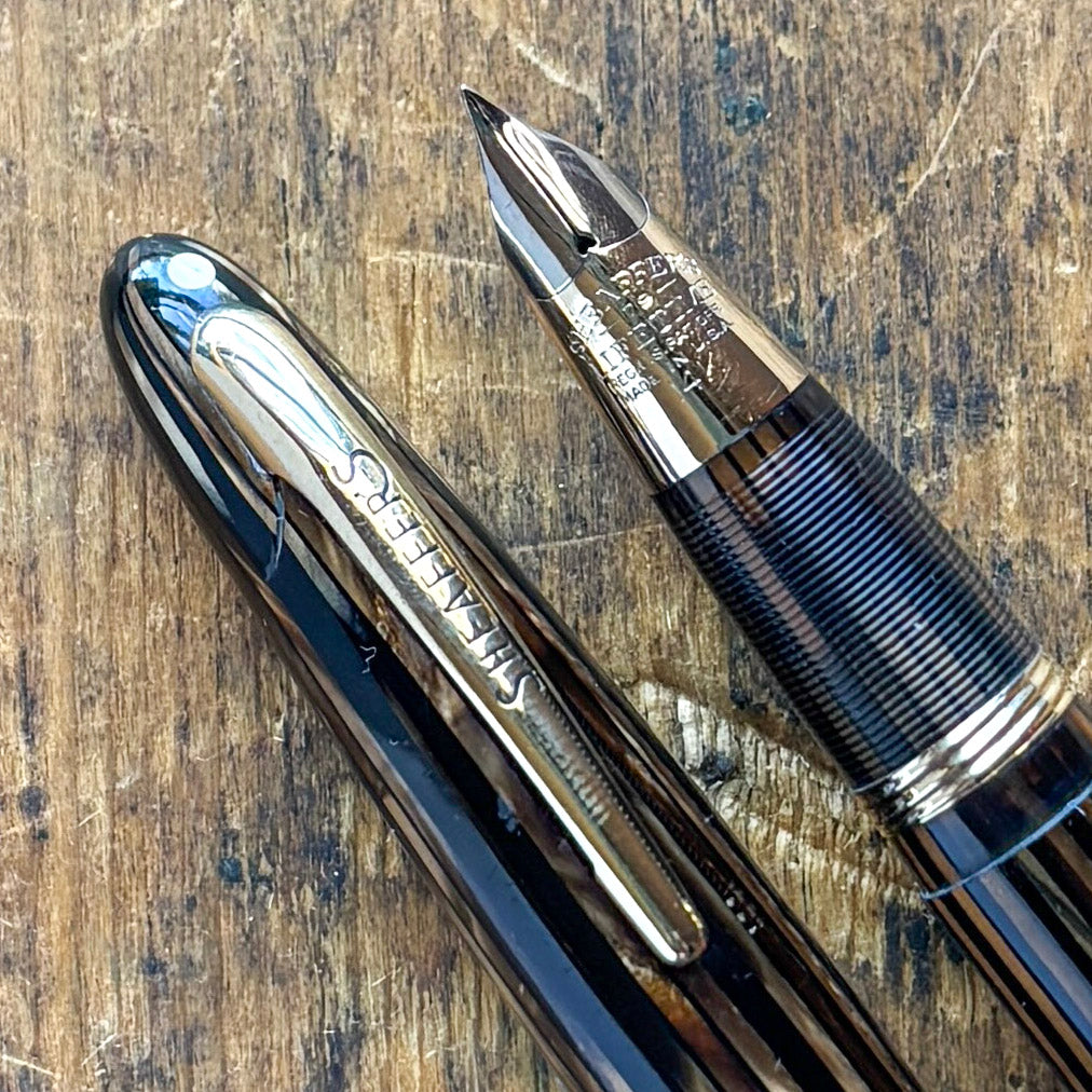 Sheaffer Triumph Sovereign II 1500, Golden Brown, Wire BandName/Type: Sheaffer Triumph Sovereign II 1500 Manufacture Year: 1940s Length: 4 7/8 Filling System: Restored Vac-fil Color/Pattern: Golden Brown with gold-filled trim Nib Type/Condition and Remark