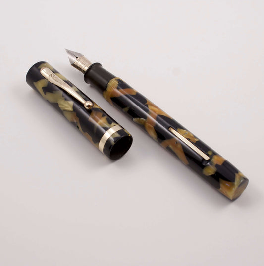 Sheaffer Large Flat Top Black and Pearl Fountain Pen, Medium Nib, Lever Fill Type: Sheaffer Flat Top Fountain Pen Manufacturer and Year: 1920's Length: 5 1/4 inch Filling System: Lever Color/Pattern: Black and Pearl Nib Type/Condition and remarks: Medium
