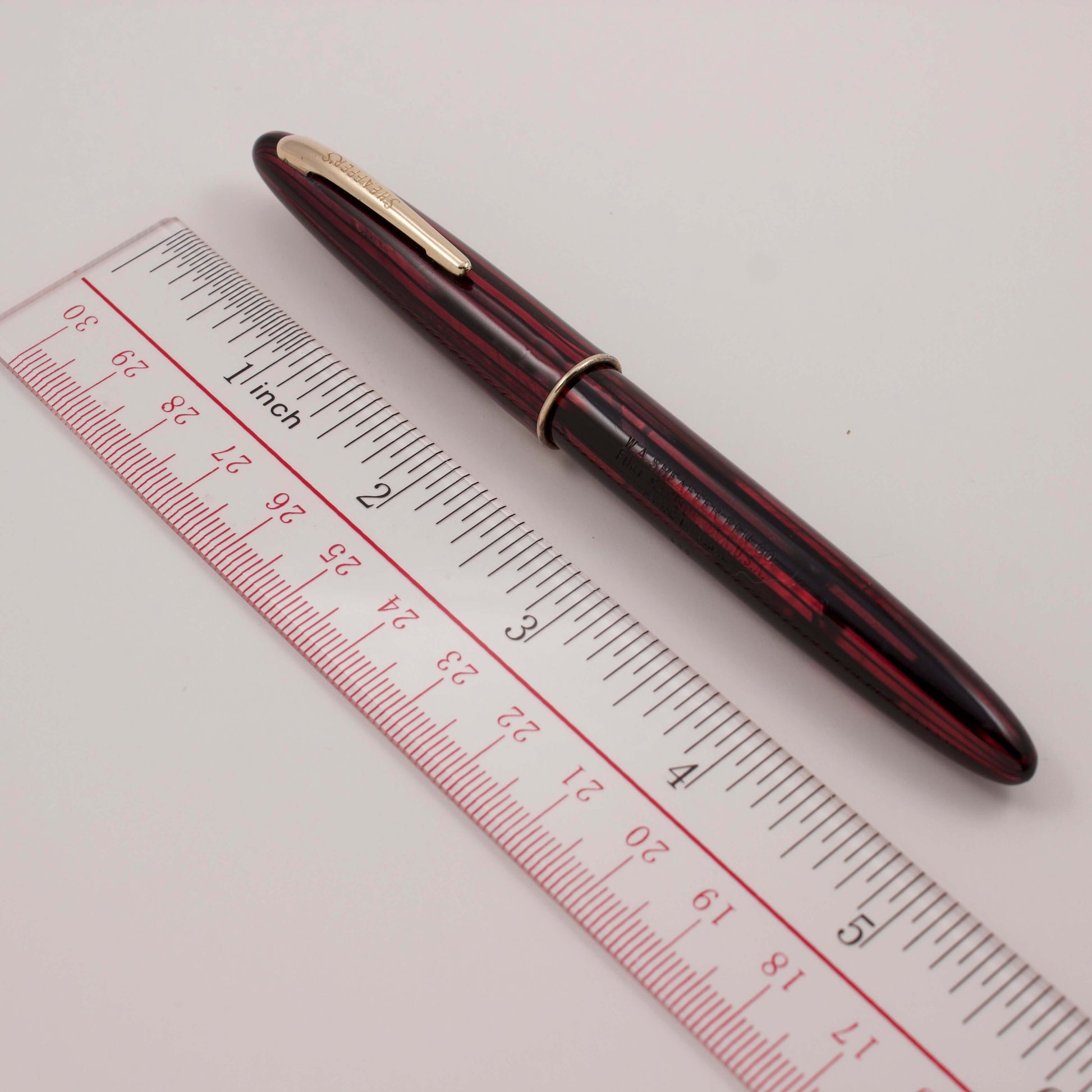 Sheaffer Craftsman Lever Filler, Carmine Red. Number 5 Feather Touch 14K Gold Nib Fine Point. Type: Lever Filler Vintage Fountain Pen Product Name: Sheaffer Craftsman Manufacturer and Year: Approx. 1945 Length: 5 Inches Filling System: Lever Filler, with