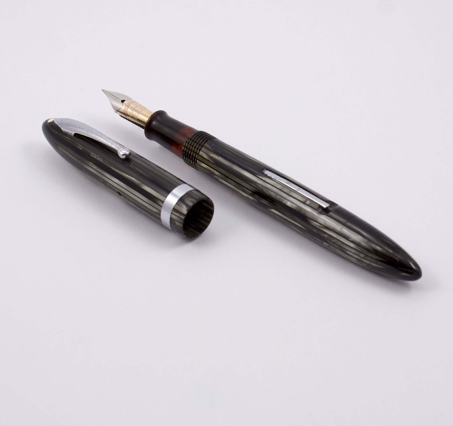 Sheaffer Balance, Short Standard Girth. White Dot. 14K Gold Two-tone Lifetime Nib. Lever Filler, Gray Pearl; Restored Type: Lifetime Sheaffer Balance Manufacturer and Year: 1936 Length: 4 3/4 Filling System: Lever filler with new sac Color/Pattern: Gray P