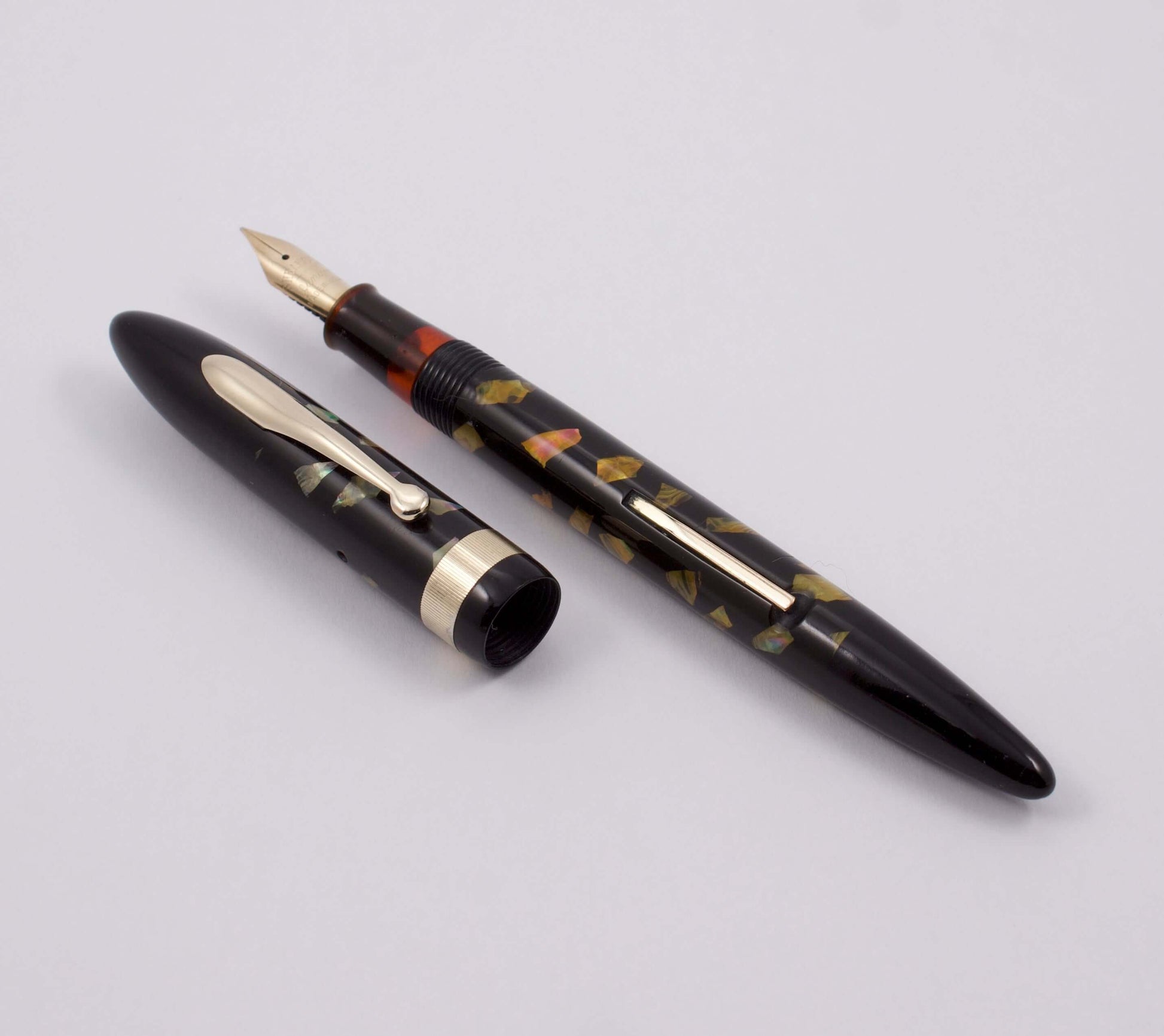 Sheaffer Fountain Pen, Ebonized Pearl, Wide Milled Cap, Lever Fill, 14K Gold Junior Medium Nib, Pen and Pencil Set Type: Lever Filling Fountain Pen and Mechanical Pencil Product Name: Sheaffer Length: 5 1/4 Filling System: Lever filling with a new sac. Co