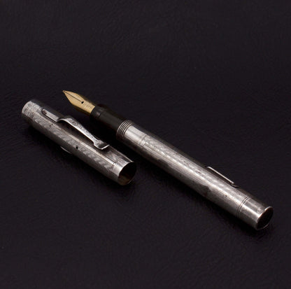 Wahl, Sterling Silver 1920's Fountain Pen with Lever Filler, Number Four 14K Gold Nib, Flexy; Fully Restored Product Name: WAHL All Metal Fountain Pen Manufacture Year: 1920's Length: 4 5/8 Filling System: Lever, restored with new sac Color/Pattern: Sterl