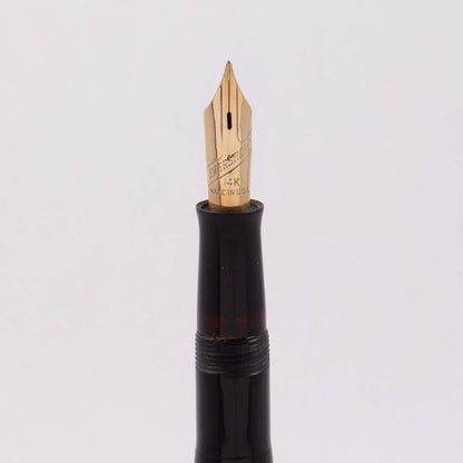 Eversharp Skyline Fountain Pen, Black Cap and Barrel. Gold Filled Trim, Fine 14k Nib Type: Restored Lever Filling Fountain Pen Product Name: Eversharp Skyline Manufacture Year: 1940's Length: 5 1/4 Filling System: Lever Filler with new sac Color/Pattern: