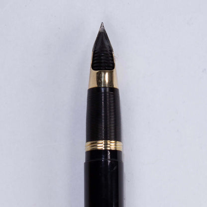 ${titleName/Type: Sheaffer Triumph Crest Manufacture Year: Circa 1940s Length: 5 1/4 Filling System: Lever filler with new sac Color/Pattern: Black Barrel with lined solid gold cap Nib Type/Condition and remarks: Large two-toned Triumph Wrap around Fine n