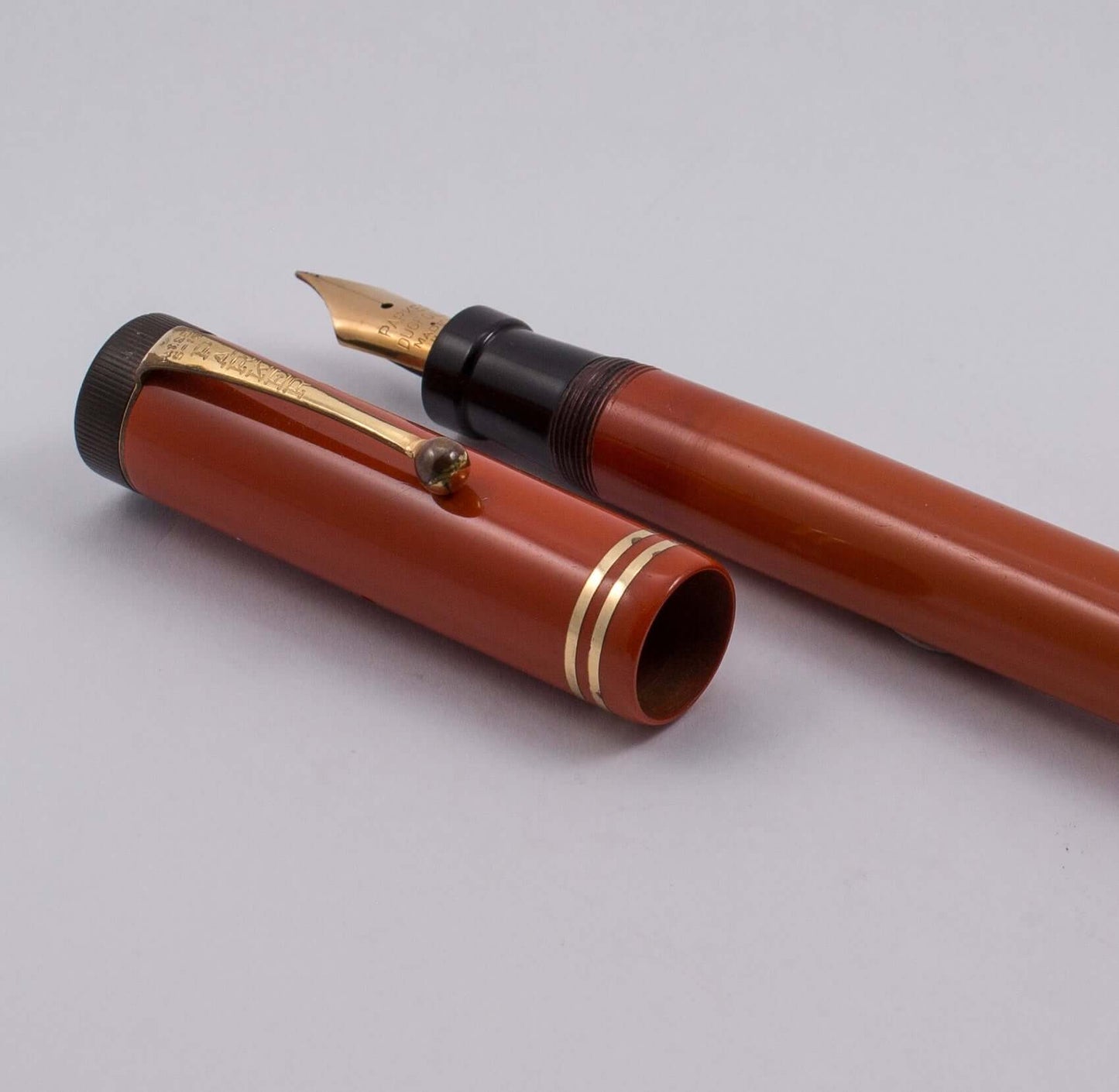 Fully restored, Parker Senior Duofold Fountain Pen, Two cap Bands, Button Filler Type: Restored Vintage Senior Duofold Fountain Pen Product Name: Parker Senior Duofold Manufacture Year: Late 1920's Length: 5 1/2 Filling System: Button Filler, Restored wit