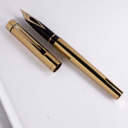 ${titleName/Type: Sheaffer Targa Manufacture Year: Circa 1986- 1996 Length: 5 3/8 Filling System: Cartridge Converter Color/Pattern: Brilliant Shined Brass with Lacquered Finish Nib Type/Condition and remarks: 14K Gold Inlaid Medium Nib Condition: This Sh