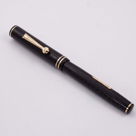 Wahl, Black Chased Hard Rubber, Gold Filled Trim, Roller Clip, Flexible 14k Nib Type: Restored Fountain Pen Product Name:﻿ ﻿Wahl Fountain Pen Manufacture Year: 1920's Length: 5 1/8 Filling System: Lever Filler, restored with new sac Color/Pattern: Black C