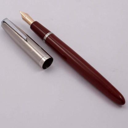Parker VS Fountain Pen, 1947, Rust-colored Barrel and Lustraloy Cap, Button Filler with a 14k Gold Nib Type: Restored Fountain Pen Product Name: Parker VS Manufacture Year: 1947 Length: 5 1/2 Filling System: Button filler with aluminum button Color/Patter
