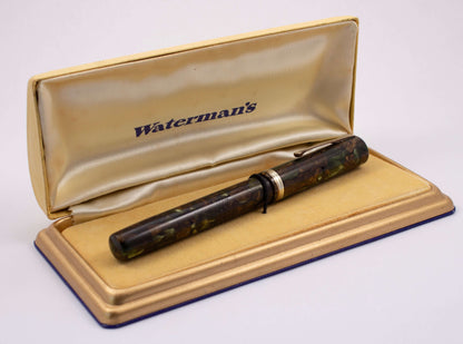Waterman's 94 Restored Fountain Pen, Moss-Agate, Fine Rigid Keyhole Nib Type: Waterman's Model 94 Product Name: Manufacture Year: 1930's Length: 5 Filling System: Lever Filler, restored with new sac and is in working condition Color/Pattern: Moss-Agate Ni