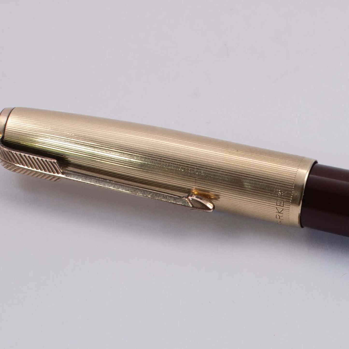 Parker 51 Demi Vacumatic, Cordovan Brown, Gold Filled Lined Cap, Fine 14K gold nib Type: Vintage Fountain Pen Product Name: Parker 51 Vacumatic Manufacture Year: 1947 Length: 4 7/8 Filling System: Vacumatic, restored with new diaphragm Color/Pattern: Cord