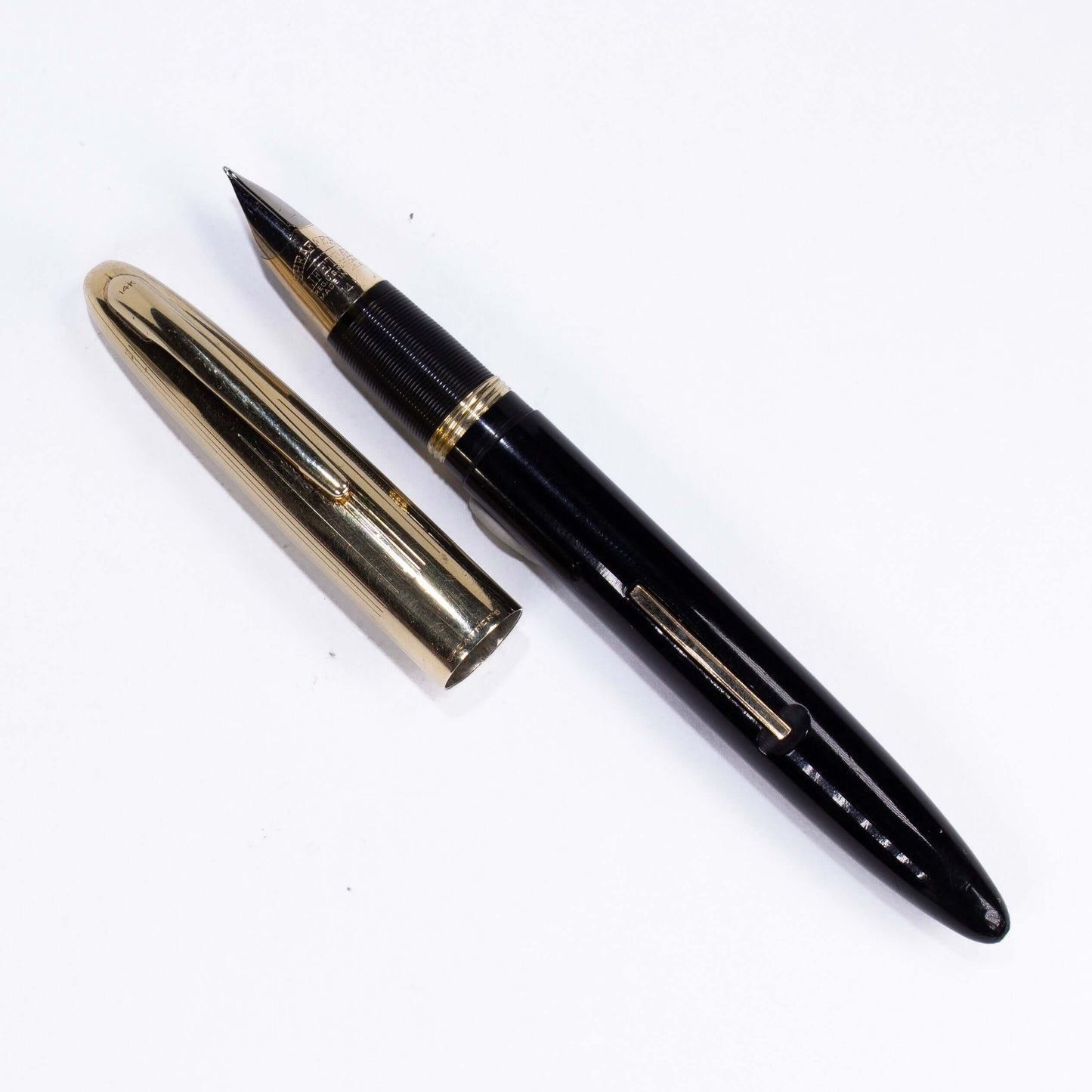 Sheaffer Triumph Crest Lever Filler Fountain Pen, Black with 14K Gold Cap and Hallmarked Cap and Clip Large two-toned wrap around Triumph 14K gold fine nib  Ozark Pen Shop   