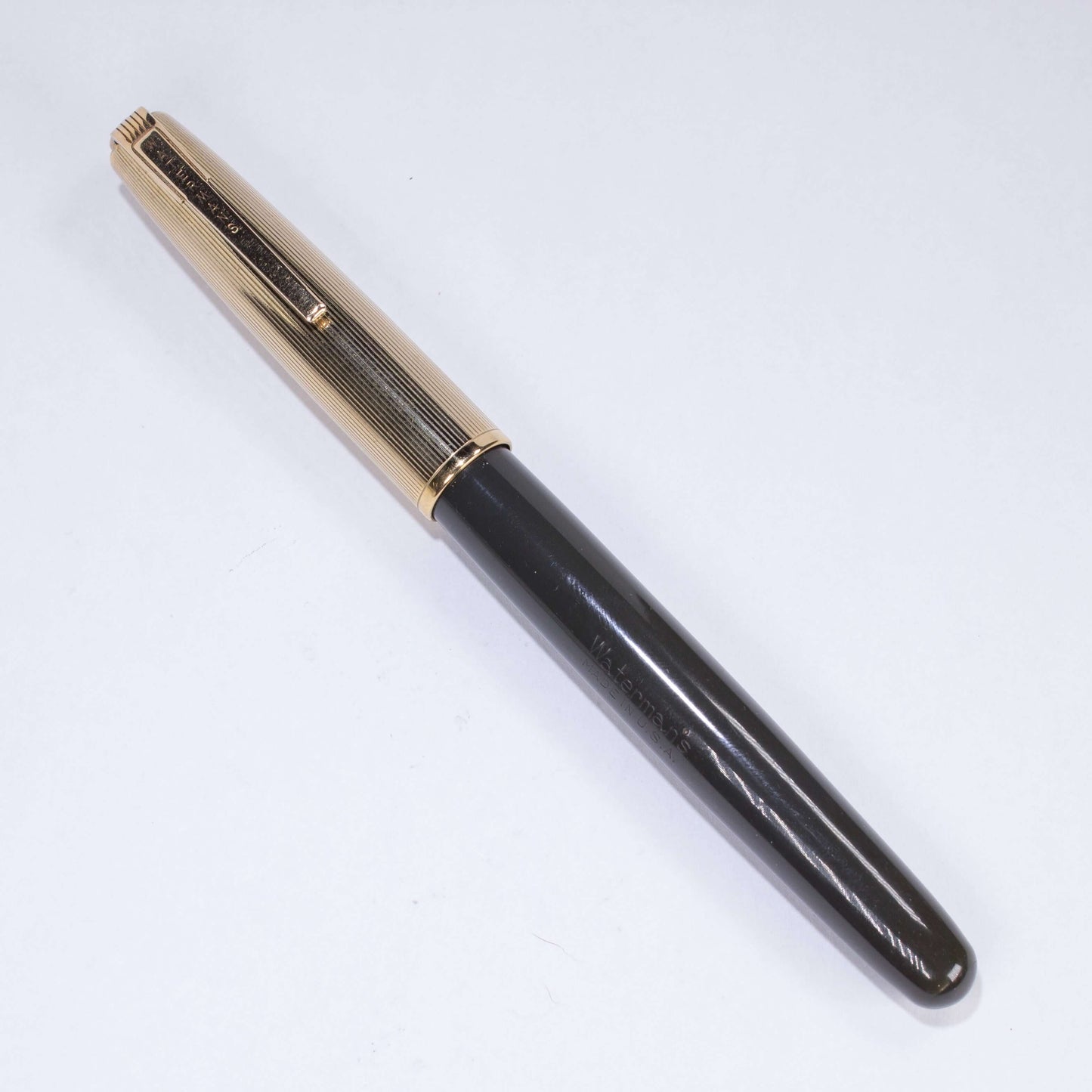 ${titleName/Type: Waterman Corinth Fountain Pen Manufacture Year: Late 1940s Length: 5 1/4 Filling System: Lever filler with new sac Color/Pattern: Grey barrel with gold filled cap Nib Type/Condition and remarks: 14K Fine Ridged Waterman nib Condition: ﻿