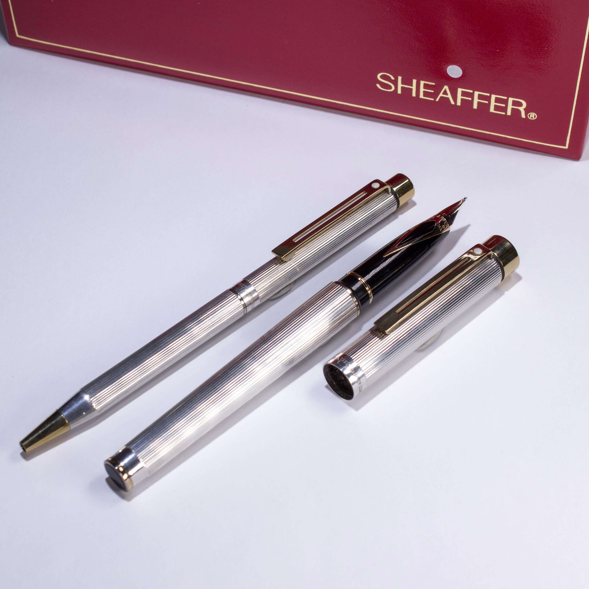 ${titleName/Type: Sheaffer Targa Fountain Pen/Ballpoint Set Manufacture Year: 1988 - 1996 Length: 5 3/8 Filling System: Cartridge/Converter, Converter included Color/Pattern: Sterling Silver Hallmarked Nib Type/Condition and remarks: Medium Inlaid 14K nib