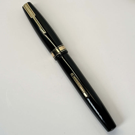 Waterman Hundred Year Pen, Fountain Pen- Standard size. Flexy Waterman nib. Lever-fill; restored. Name/Type: Waterman Hundred Year Fountain Pen Manufacture Year: 1940s Length: 4 5/8 Filling System: Lever-filler; restored. Color/Pattern: Black with gold fi