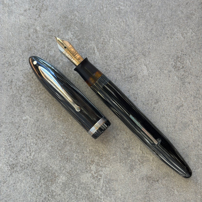 Fountain pen on a gray surface